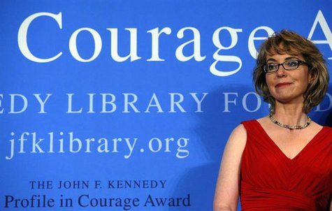 2013 John F. Kennedy Profile in Courage Award recipient, former U.S. congresswoman Gabrielle Giffords, listens as her husband Mark Kelly spe 2013 John F. Kennedy Profile in Courage Award recipient, former U.S. congresswoman Gabrielle Giffords, listens as her husband Mark Kelly spe