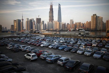 A parking lot is seen along the Huangpu River near the financial district of Pudong in Shanghai December 12, 2012. REUTERS/Carlos Barria A parking lot is seen along the Huangpu River near the financial district of Pudong in Shanghai December 12, 2012. REUTERS/Carlos Barria