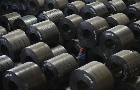 An employee works inside a steel export factory in Taiyuan, Shanxi province, April 10, 2013. REUTERS/Jon Woo An employee works inside a steel export factory in Taiyuan, Shanxi province, April 10, 2013. REUTERS/Jon Woo