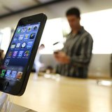 An iPhone 5 is displayed in an Apple store in central Sydney shortly after going on sale to the public September 21, 2012. REUTERS/Tim Wimbo