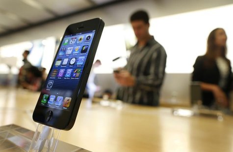 An iPhone 5 is displayed in an Apple store in central Sydney shortly after going on sale to the public September 21, 2012. REUTERS/Tim Wimbo An iPhone 5 is displayed in an Apple store in central Sydney shortly after going on sale to the public September 21, 2012. REUTERS/Tim Wimbo
