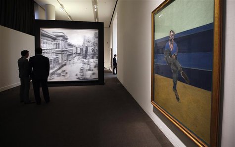 Visitors view Gerhard Richter's 'Domplatz, Mailand (Cathedral Square, Milan)' (L), oil on canvas and executed in 1968, estimated between $30 Visitors view Gerhard Richter's 'Domplatz, Mailand (Cathedral Square, Milan)' (L), oil on canvas and executed in 1968, estimated between $30