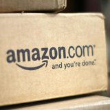 A box from Amazon.com is pictured on the porch of a house in Golden, Colorado July 23, 2008. Online retailer Amazon.com Inc said on Wednesda