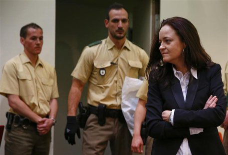Beate Zschaepe, a member of the neo-Nazi group National Socialist Underground (NSU) stands in the court before the start of her trial in Mun Beate Zschaepe, a member of the neo-Nazi group National Socialist Underground (NSU) stands in the court before the start of her trial in Mun