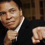 U.S. boxing great Muhammad Ali poses during the Crystal Award ceremony at the World Economic Forum (WEF) in Davos, Switzerland January 28, 2
