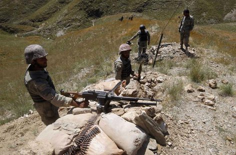 Afghan border policemen take their positions at the Goshta district of Nangarhar province border, where Afghanistan shares borders with Paki Afghan border policemen take their positions at the Goshta district of Nangarhar province border, where Afghanistan shares borders with Paki