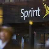 People walk past a Sprint store in New York December 17, 2012. REUTERS/Andrew Kelly People walk past a Sprint store in New York December 17, 2012. REUTERS/Andrew Kelly