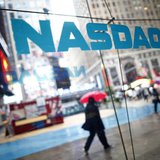 Pedestrians walk past the NASDAQ MarketSite in New York's Times Square in this June 4, 2012 file photo. REUTERS/Eric Thayer/Files Pedestrians walk past the NASDAQ MarketSite in New York's Times Square in this June 4, 2012 file photo. REUTERS/Eric Thayer/Files