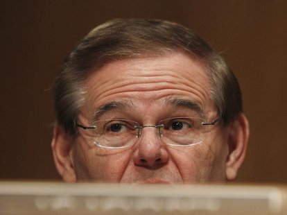 Senator Robert Menendez (D-NJ), a member of the Senate Banking, Housing and Urban Affairs Committee, asks questions during testimony in Wash Senator Robert Menendez (D-NJ), a member of the Senate Banking, Housing and Urban Affairs Committee, asks questions during testimony in Wash