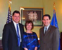 Marathon County Chief Deputy Scott Parks, his wife Theresa, and Governor Scott Walker Marathon County Chief Deputy Scott Parks, his wife Theresa, and Governor Scott Walker