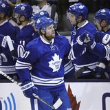Toronto Maple Leafs' Phil Kessel (C) celebrates with teammates after scoring against the Boston Bruins during the second period in Game 3 of