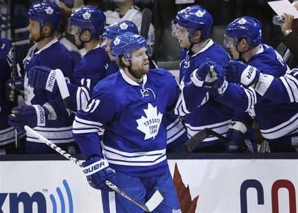 Toronto Maple Leafs' Phil Kessel (C) celebrates with teammates after scoring against the Boston Bruins during the second period in Game 3 of Toronto Maple Leafs' Phil Kessel (C) celebrates with teammates after scoring against the Boston Bruins during the second period in Game 3 of
