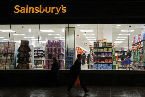 People walk past a Sainsbury's store in south London November 11, 2009. REUTERS/Stefan Wermuth People walk past a Sainsbury's store in south London November 11, 2009. REUTERS/Stefan Wermuth