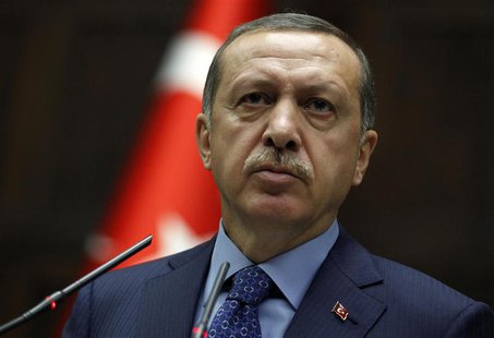 Turkey's Prime Minister Tayyip Erdogan addresses members of parliament from his ruling AK Party (AKP) during a meeting at the Turkish parlia Turkey's Prime Minister Tayyip Erdogan addresses members of parliament from his ruling AK Party (AKP) during a meeting at the Turkish parlia