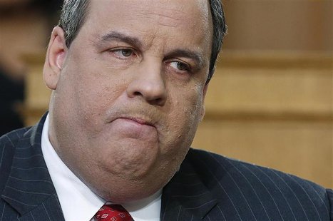 New Jersey Governor Chris Christie looks on while giving his State of the State address in the assembly chamber in Trenton, New Jersey, in t New Jersey Governor Chris Christie looks on while giving his State of the State address in the assembly chamber in Trenton, New Jersey, in t