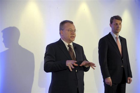 Nokia's Chief Executive Stephen Elop gestures as Nokia Board Chairman Risto Siilasmaa (R) looks on, at a news conference prior to the Annual Nokia's Chief Executive Stephen Elop gestures as Nokia Board Chairman Risto Siilasmaa (R) looks on, at a news conference prior to the Annual