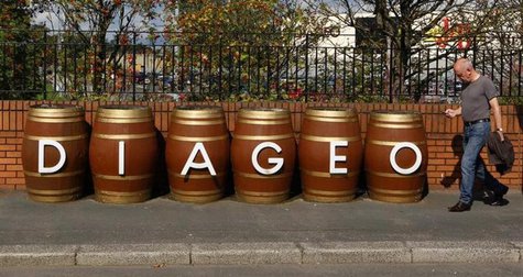 A man walks past barrels outside the Diageo Shieldhall facility near Glasgow, Scotland August 26, 2010. REUTERS/David Moir A man walks past barrels outside the Diageo Shieldhall facility near Glasgow, Scotland August 26, 2010. REUTERS/David Moir