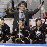 Buffalo Sabres interim head coach Ron Rolston (top) reacts to a penalty during the second period of their NHL hockey game against the Montre