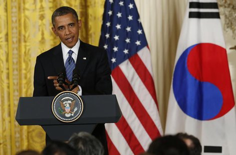 U.S. President Barack Obama faces a joint news conference in the East Room of the White House in Washington, May 7, 2013. REUTERS/Kevin Lama U.S. President Barack Obama faces a joint news conference in the East Room of the White House in Washington, May 7, 2013. REUTERS/Kevin Lama