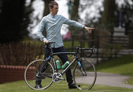 British cyclist Bradley Wiggins poses for photographers during a press day for the Giro d'Italia cycle race at the Kilhey Court hotel in Sta British cyclist Bradley Wiggins poses for photographers during a press day for the Giro d'Italia cycle race at the Kilhey Court hotel in Sta