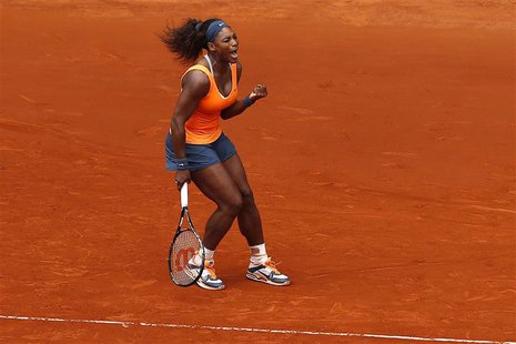 Serena Williams of the U.S. celebrates her victory against Lourdes Dominguez Lino of Spain during their women's singles match at the Madrid Serena Williams of the U.S. celebrates her victory against Lourdes Dominguez Lino of Spain during their women's singles match at the Madrid