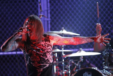 Singer Tim Lambesis of As I Lay Dying performs at the 2nd annual Golden Gods awards in Los Angeles April 8, 2010. REUTERS/Mario Anzuoni Singer Tim Lambesis of As I Lay Dying performs at the 2nd annual Golden Gods awards in Los Angeles April 8, 2010. REUTERS/Mario Anzuoni