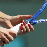 Agnieszka Radwanska of Poland grips her racquet as she receives serve from Elena Dementieva of Russia during their match at the Indian Wells Agnieszka Radwanska of Poland grips her racquet as she receives serve from Elena Dementieva of Russia during their match at the Indian Wells