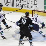 San Jose Sharks' Patrick Marleau (L, in black) scores the winning goal in overtime over the Vancouver Canucks during Game 4 of their NHL Wes San Jose Sharks' Patrick Marleau (L, in black) scores the winning goal in overtime over the Vancouver Canucks during Game 4 of their NHL Wes