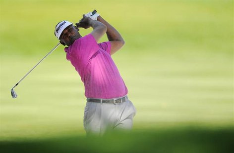 Fiji's Vijay Singh watches his shot on the 16th hole during first round play in the Arnold Palmer Invitational PGA golf tournament in Orland Fiji's Vijay Singh watches his shot on the 16th hole during first round play in the Arnold Palmer Invitational PGA golf tournament in Orland