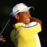 Tiger Woods of the U.S. watches his tee shot on the 10th hole during a practice round before The Players Championship PGA golf tournament at