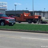 Emergency crews respond to a crash between a moped and an Outagamie County truck on Hwy. CE east of Appleton, May 8, 2013. (courtesy of FOX 11).