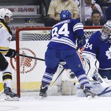 Boston Bruins' David Krejci (L) scores on Toronto Maple Leafs' James Reimer (R) as the Leafs' Mikhail Grabovski follows the play during the Boston Bruins' David Krejci (L) scores on Toronto Maple Leafs' James Reimer (R) as the Leafs' Mikhail Grabovski follows the play during the