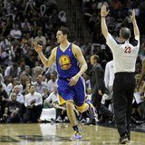 Golden State Warriors guard Klay Thompson reacts after hitting a three-point shot against the San Antonio Spurs during the second half of th Golden State Warriors guard Klay Thompson reacts after hitting a three-point shot against the San Antonio Spurs during the second half of th