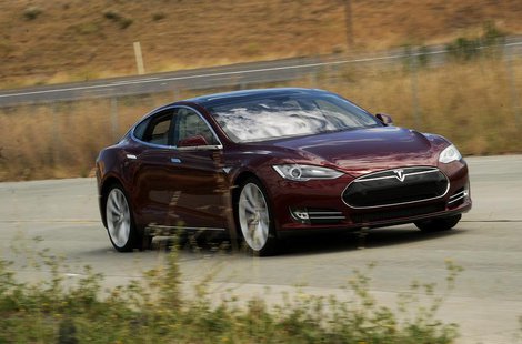 A Tesla Model S electric sedan is driven near the company's factory in Fremont, California, June 22, 2012. REUTERS/Noah Berger A Tesla Model S electric sedan is driven near the company's factory in Fremont, California, June 22, 2012. REUTERS/Noah Berger