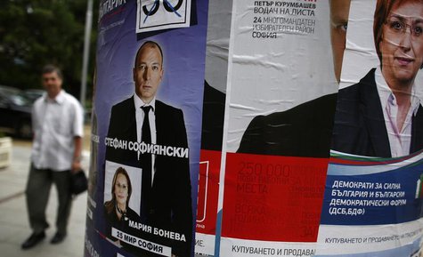 A man walks past political election posters in central Sofia May 8, 2013. REUTERS/Stoyan Nenov A man walks past political election posters in central Sofia May 8, 2013. REUTERS/Stoyan Nenov