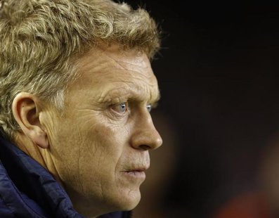 Everton's coach David Moyes watches ahead of their English Premier League soccer match against West Bromwich Albion at Goodison Park in Live Everton's coach David Moyes watches ahead of their English Premier League soccer match against West Bromwich Albion at Goodison Park in Live