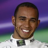 Mercedes Formula One driver Lewis Hamilton of Britain smiles at a press conference after the qualifying session for the Chinese F1 Grand Pri Mercedes Formula One driver Lewis Hamilton of Britain smiles at a press conference after the qualifying session for the Chinese F1 Grand Pri