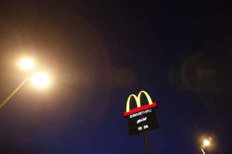 The corporate logo of McDonald's Corp fast food chain is seen on display in the Malaysian town of Pekan May 4, 2013. REUTERS/Bazuki Muhammad The corporate logo of McDonald's Corp fast food chain is seen on display in the Malaysian town of Pekan May 4, 2013. REUTERS/Bazuki Muhammad