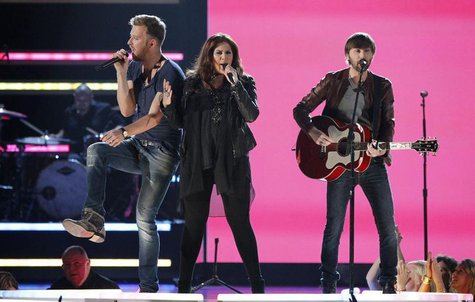 Charles Kelley (L), Hillary Scott and Dave Haywood of Lady Antebellum perform the song "Downtown" during the 48th ACM Awards in Las Vegas Ap Charles Kelley (L), Hillary Scott and Dave Haywood of Lady Antebellum perform the song "Downtown" during the 48th ACM Awards in Las Vegas Ap