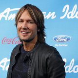 Country singer and judge Keith Urban poses at the party for the finalists of the television show "American Idol" in Los Angeles, California 