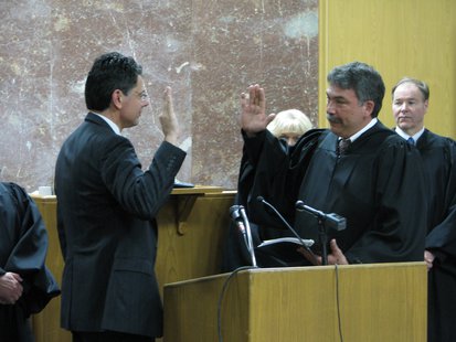 Sheriff Scott Parks takes oath of office from Judge Greg Grau Sheriff Scott Parks takes oath of office from Judge Greg Grau