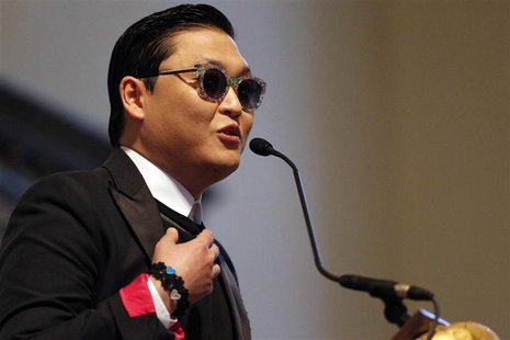South Korean singer PSY speaks at Harvard University's Memorial Church in Cambridge, Massachusetts May 9, 2013. REUTERS/Jessica Rinaldi South Korean singer PSY speaks at Harvard University's Memorial Church in Cambridge, Massachusetts May 9, 2013. REUTERS/Jessica Rinaldi