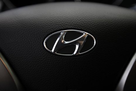 The logo of Hyundai Motor is seen on the steering wheel of a car at a Hyundai dealership in Seoul April 25, 2013. REUTERS/Kim Hong-Ji The logo of Hyundai Motor is seen on the steering wheel of a car at a Hyundai dealership in Seoul April 25, 2013. REUTERS/Kim Hong-Ji
