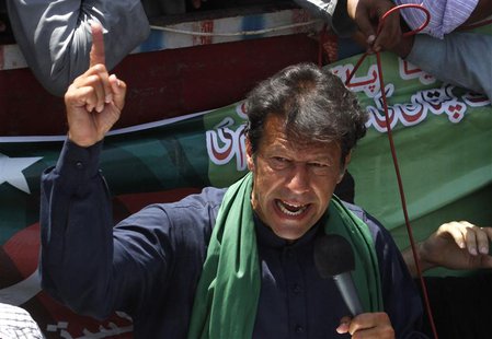 Imran Khan, Pakistani cricketer-turned-politician and chairman of political party Pakistan Tehreek-e-Insaf (PTI), addresses his supporters a Imran Khan, Pakistani cricketer-turned-politician and chairman of political party Pakistan Tehreek-e-Insaf (PTI), addresses his supporters a