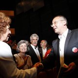 Bulgarian Socialist Party (BSP) leader Sergei Stanishev shakes hands with a supporter during an election rally at the National Palace of Cul