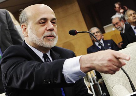 U.S. Federal Reserve Chairman Ben Bernanke gestures at the International Monetary and Financial Committee (IMFC) meeting during the Spring M U.S. Federal Reserve Chairman Ben Bernanke gestures at the International Monetary and Financial Committee (IMFC) meeting during the Spring M