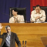 Gholam Ali Haddad Adel (lower left) waves after a speech in Manila with then Philippine President Gloria Arroyo (upper left) and Jose De Ven