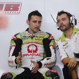 MotoGP rider Hector Barbera of Spain (L) speaks to his mechanic during a free practice session ahead of the Malaysian Grand Prix in Sepang O MotoGP rider Hector Barbera of Spain (L) speaks to his mechanic during a free practice session ahead of the Malaysian Grand Prix in Sepang O