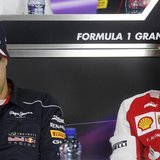Ferrari Formula One driver Fernando Alonso (R) of Spain and Red Bull driver Sebastian Vettel of Germany attend a news conference ahead of th Ferrari Formula One driver Fernando Alonso (R) of Spain and Red Bull driver Sebastian Vettel of Germany attend a news conference ahead of th