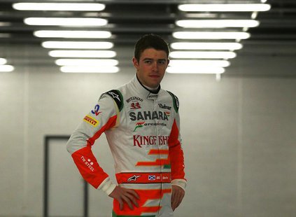 Force India Formula One driver Paul Di Resta of Britain poses for photographers during the launch of the VJM06 car at the Silverstone Race c Force India Formula One driver Paul Di Resta of Britain poses for photographers during the launch of the VJM06 car at the Silverstone Race c